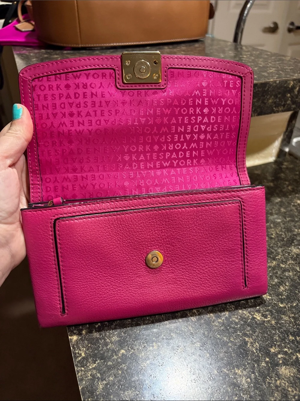 kate spade fuchsia pink leather flap wallet with gold hardware
